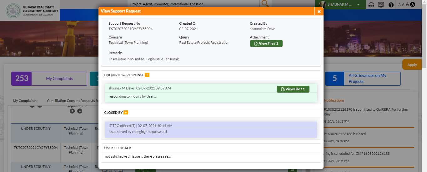 GujRERA View Support Request popup showing TKT020720210Y27Y85004, Created By shaunak M Dave, Concern Technical Town Planning, ENQUIRIES AND RESPONSE section with officer response, CLOSED BY IT TRO officer, and USER FEEDBACK section showing not satisfied response